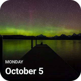 A photo of the northern lights with the date